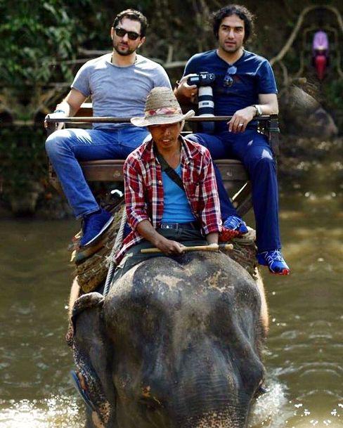 بهرام رادان در حال فیل سواری در تایلند (عکس)